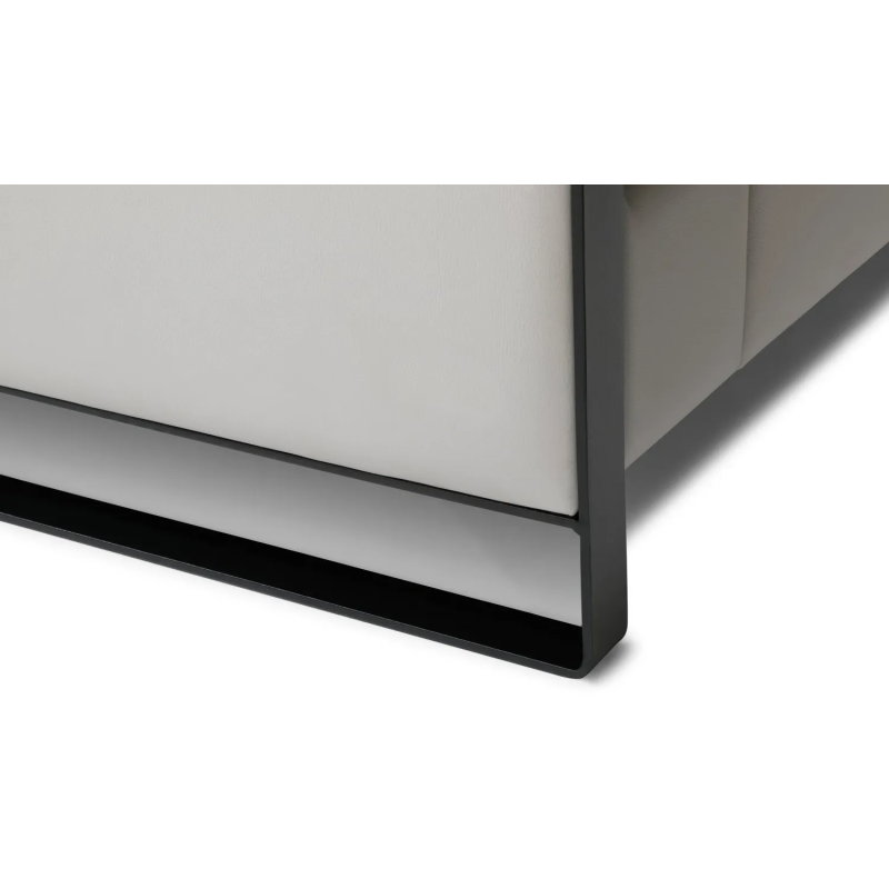 Side view of the Mayon corner sofa – featuring a sleek metal leg and elegant backrest in a modern style.