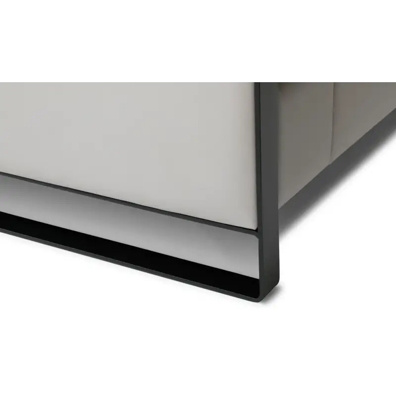 Side view of the Mayon corner sofa – featuring a sleek metal leg and elegant backrest in a modern style.